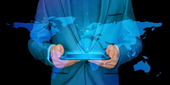 profissões do futuro homem vendo no tablet o mapa mundi projetado