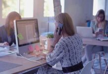 Benefícios da Nuvem e porque todos deveriam saber sobre ela mulher trabalhando e falando ao telefone