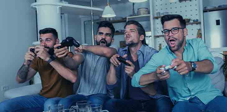 amigos jogando videogame