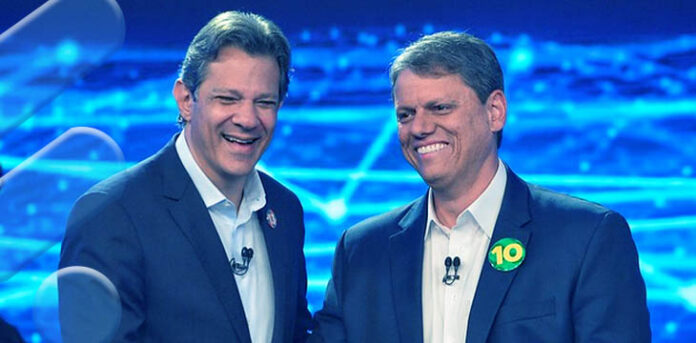 Tarcísio e Haddad durante debate